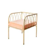 Lounge bench with gold metal frame and velvet cushion(s), visually light centerpiece setup (rental, Dubai).