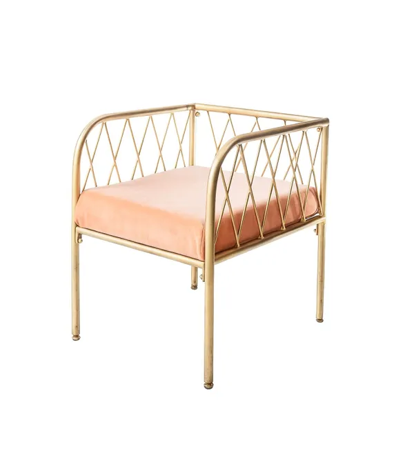 Lounge bench with gold metal frame and velvet cushion(s), visually light centerpiece setup (rental, Dubai).