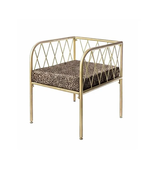 Lounge bench with gold metal frame and velvet cushion(s), visually light centerpiece setup (rental, Dubai).