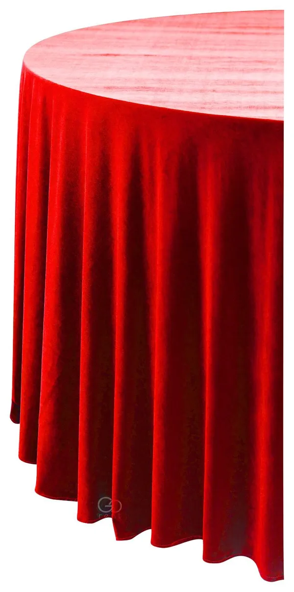 Pearlescent velvet round tablecloth, floor-length on a 180 cm table, with heavy vertical folds.