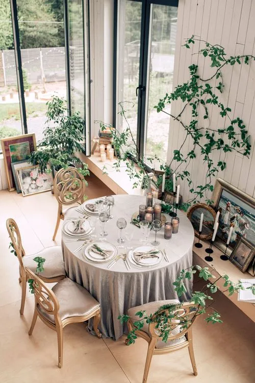 Artist’s Studio Setting — Round Table & Carved Chairs