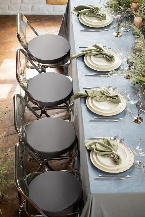 Ash-pistachio table setting at rectangular table