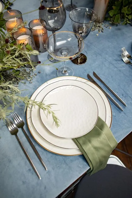 Ash-pistachio table setting at rectangular table