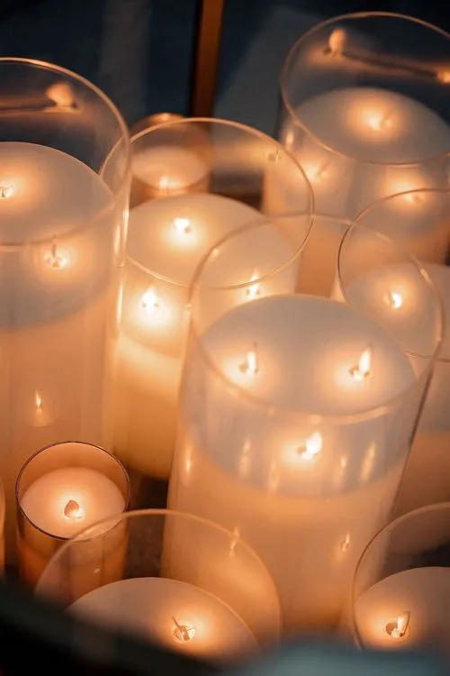 Beige candlelit table setting at round table