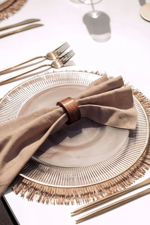 Beige set with boho accents on a white rectangular table