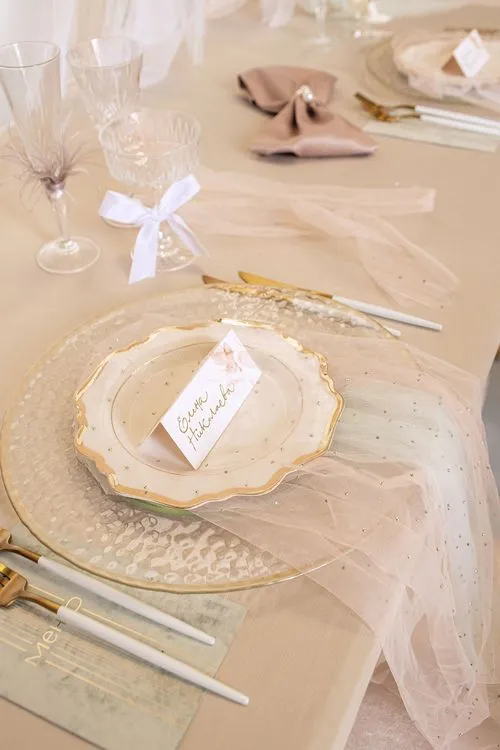 Beige table setting at rectangular table