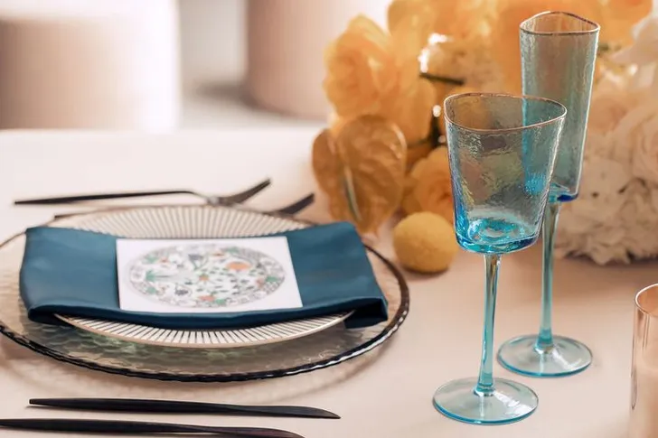 Beige table setting with blue accents