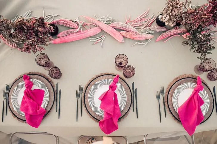Beige desert  tablescape with fuchsia accents