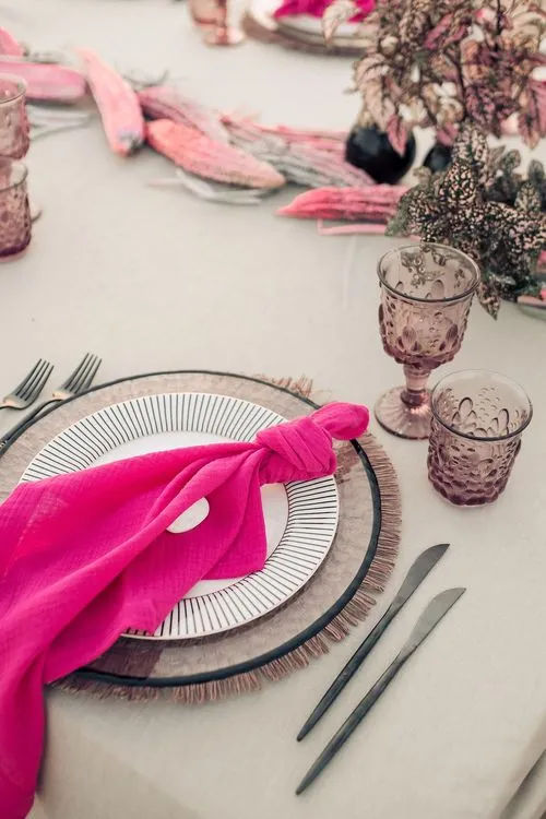 Beige desert  tablescape with fuchsia accents