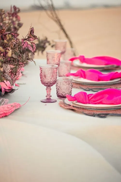 Beige desert  tablescape with fuchsia accents