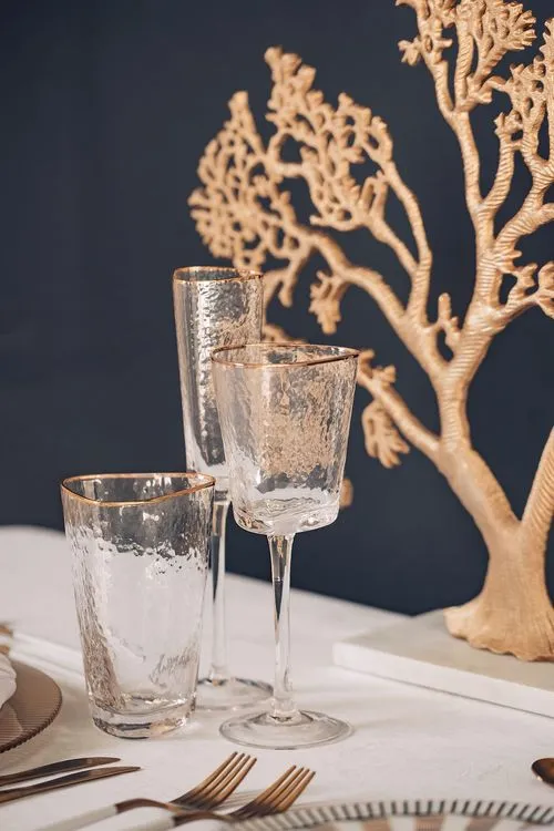 White set with gold accents on a rectangular table