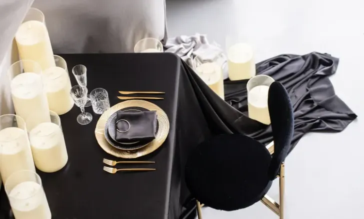 Black and gold table setting