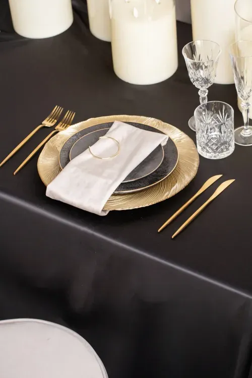 Black and gold table setting
