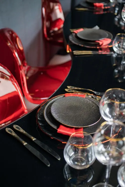 Black-Glass Serpentine, Red Panton, Charger with Red Rim