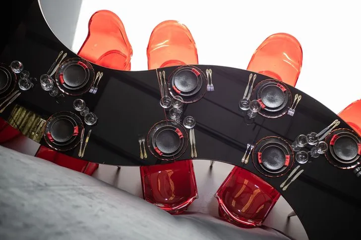 Black-Glass Serpentine, Red Panton, Charger with Red Rim