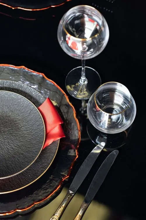 Black-Glass Serpentine, Red Panton, Charger with Red Rim