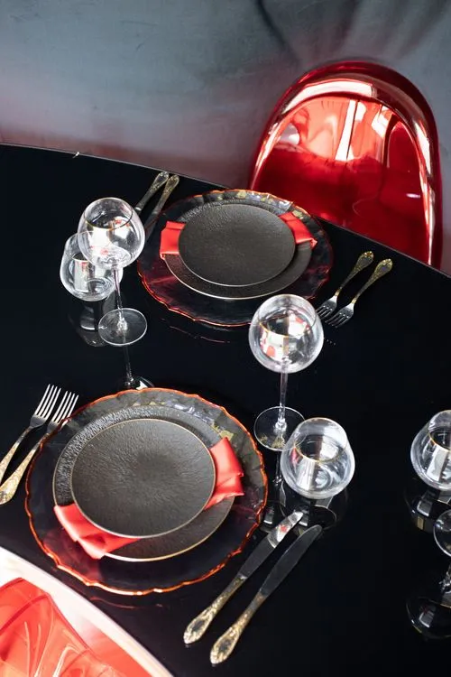Black-Glass Serpentine, Red Panton, Charger with Red Rim