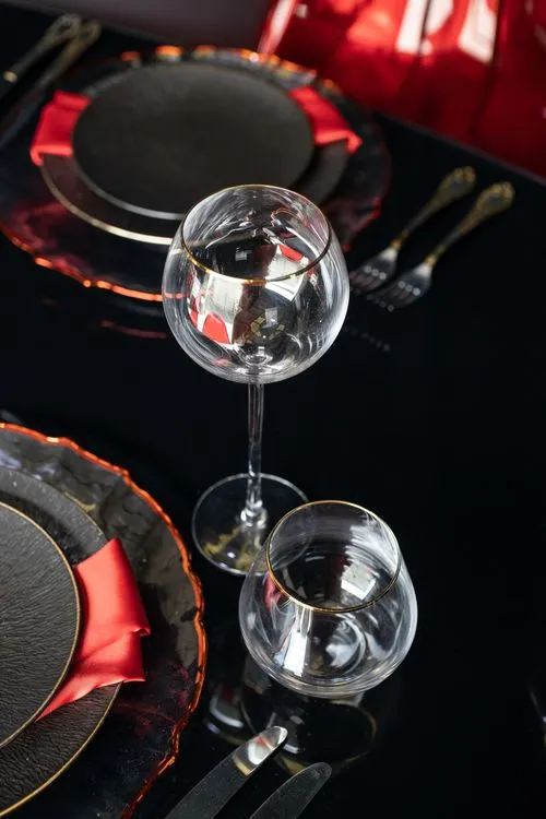 Black-Glass Serpentine, Red Panton, Charger with Red Rim