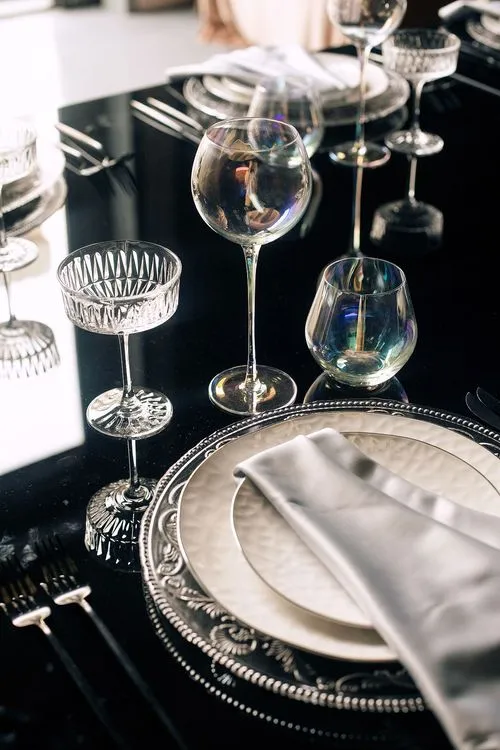 Black-white table setting at rectangular table