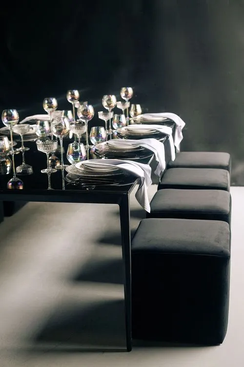 Black-white table setting at rectangular table