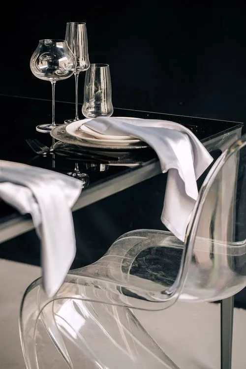 Black-white table setting at rectangular table