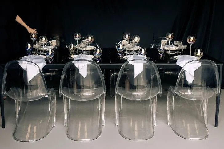 Black-white table setting at rectangular table