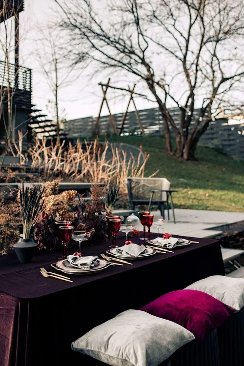 Burgundy outdoor table setting