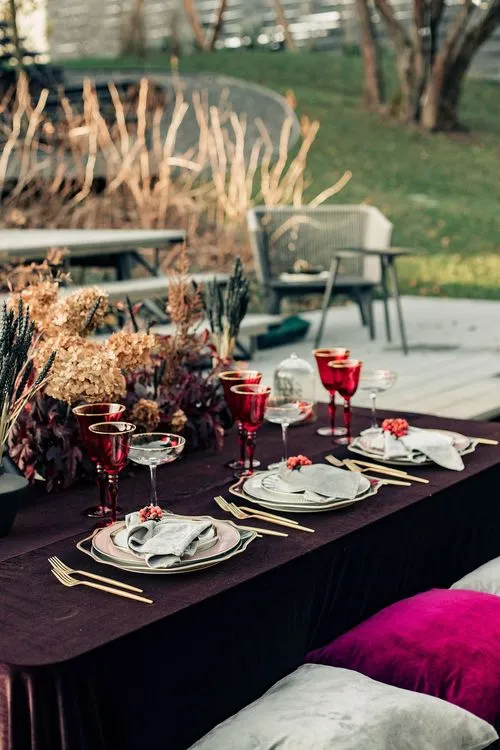 Burgundy outdoor table setting