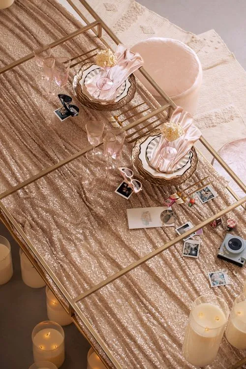 Candlelit Duo — Sequin Table, Cozy Poufs, “Titanic”