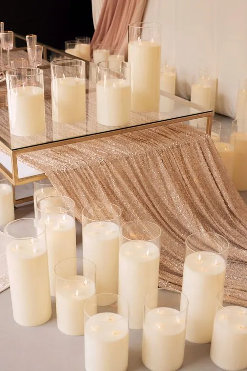 Candlelit Duo — Sequin Table, Cozy Poufs, “Titanic”