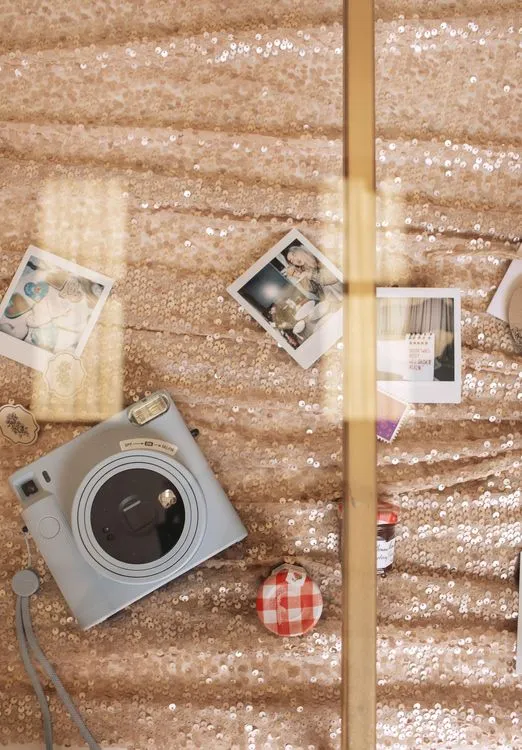Candlelit Duo — Sequin Table, Cozy Poufs, “Titanic”