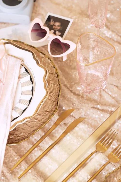 Candlelit Duo — Sequin Table, Cozy Poufs, “Titanic”