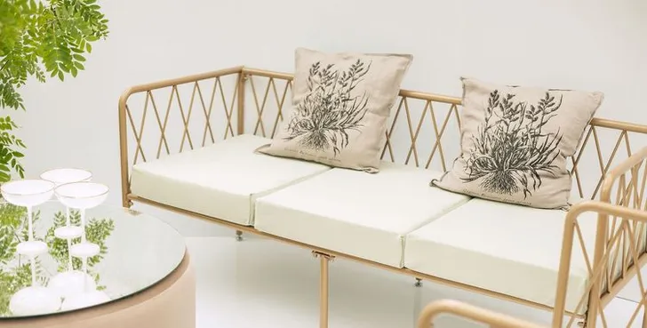 Fern and chocolate lounge setup