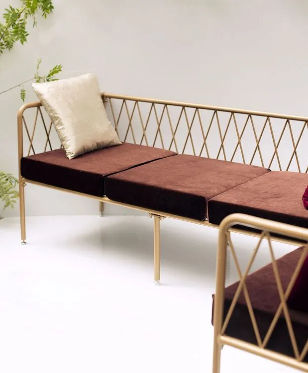 Fern and chocolate lounge setup