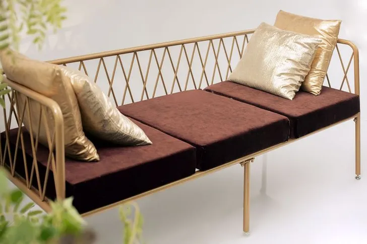 Fern and chocolate lounge setup