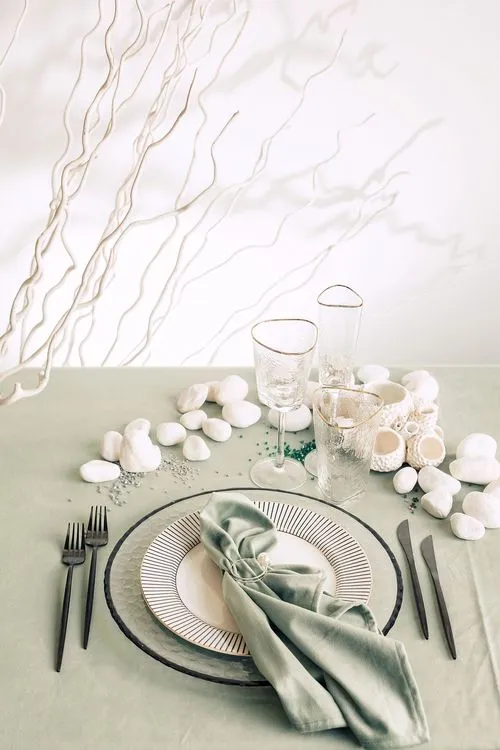 Fern table setting with graphic accents