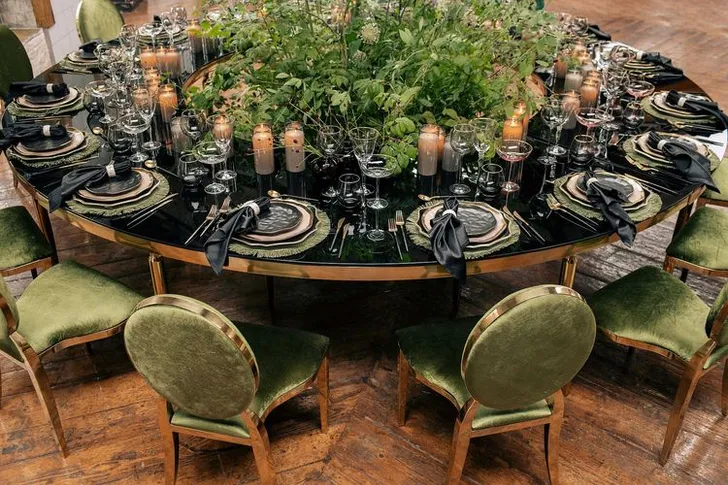 Forest table setting at large round table