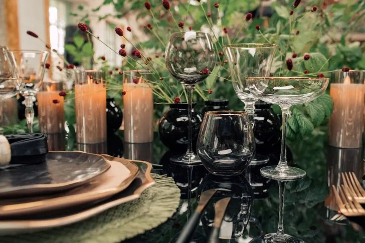 Forest table setting at large round table