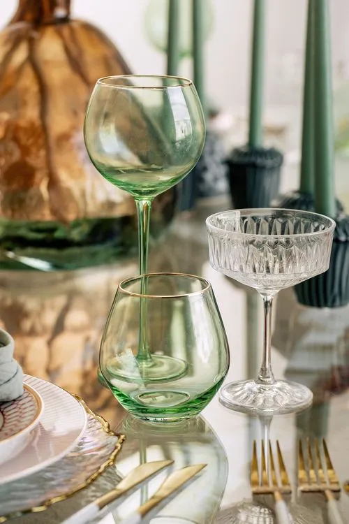 Glass round table coral dune decor