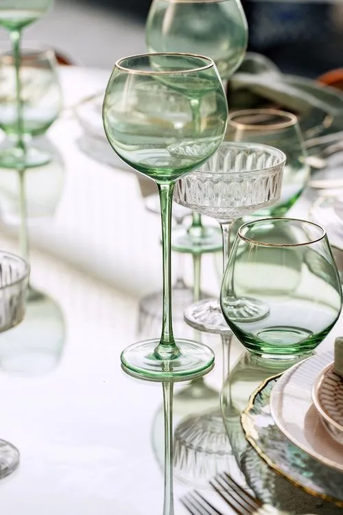 Glass round table coral dune decor