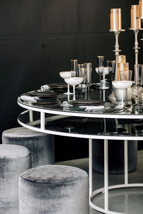 Glass round table velvet poufs