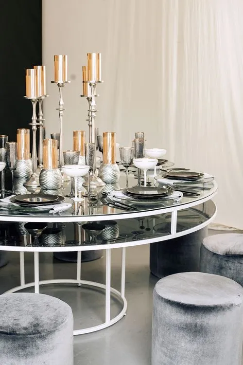 Glass round table velvet poufs