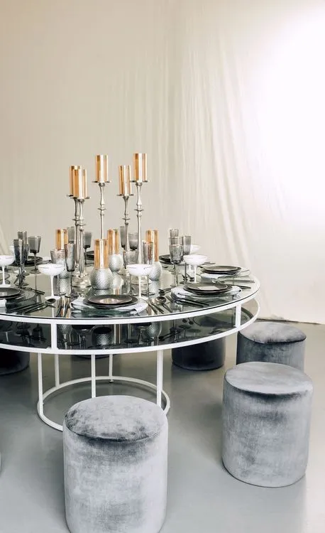 Glass round table velvet poufs