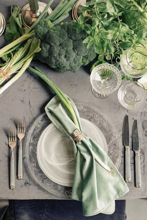 Gray-green table setting with vegetables