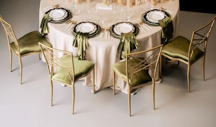 Green table setting at round table