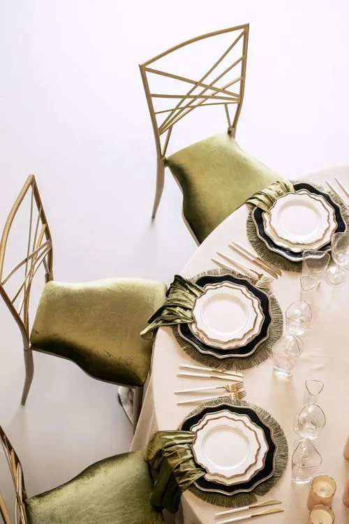 Green table setting at round table