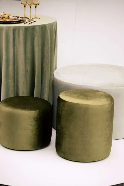 Green table setting with ottomans