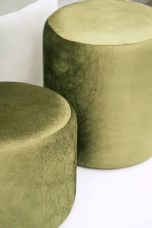 Green table setting with ottomans