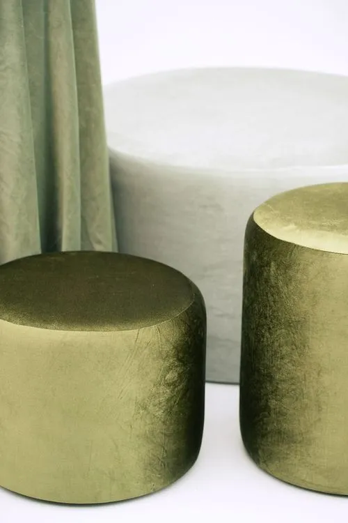 Green table setting with ottomans