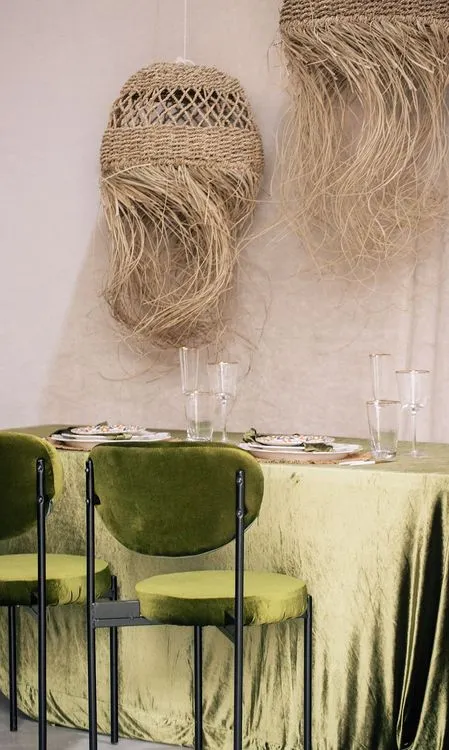 Green velvet tablescape rattan chairs
